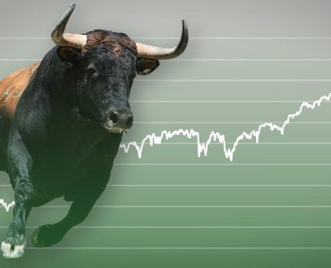 Picture of a bull running across a green chart with an upward trend line
